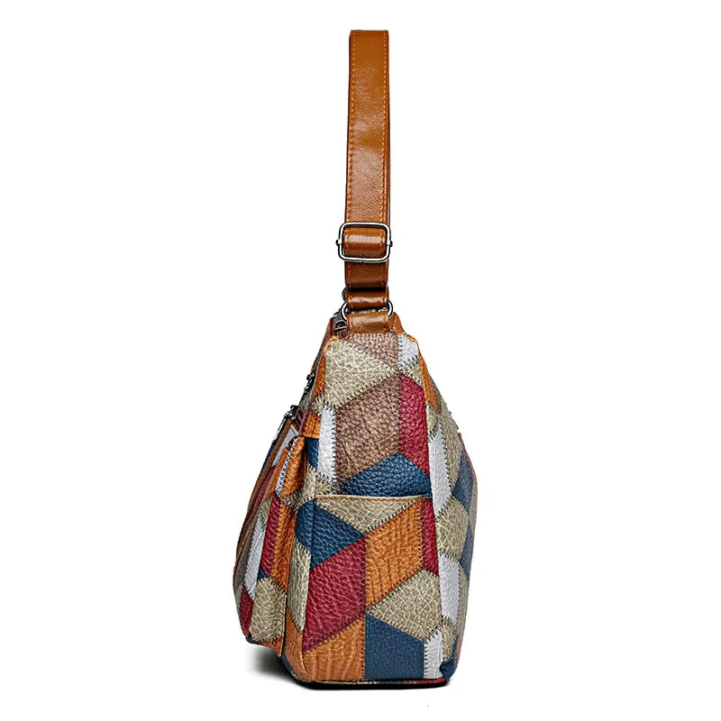 Patchwork-Tasche für den Alltag mit Einsätzen aus Kunstleder.