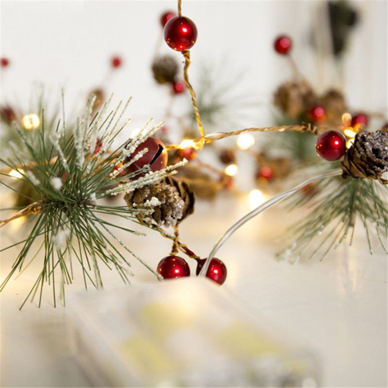 Lichterkette mit Tannenzapfen oder Sternen, 2 m mit 20 warmweissen LEDs