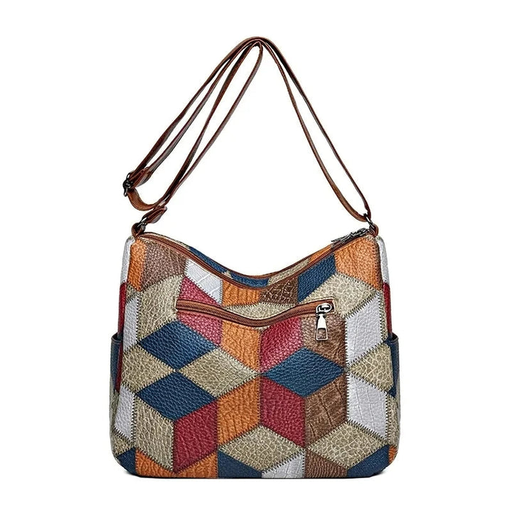 Patchwork-Tasche für den Alltag mit Einsätzen aus Kunstleder.
