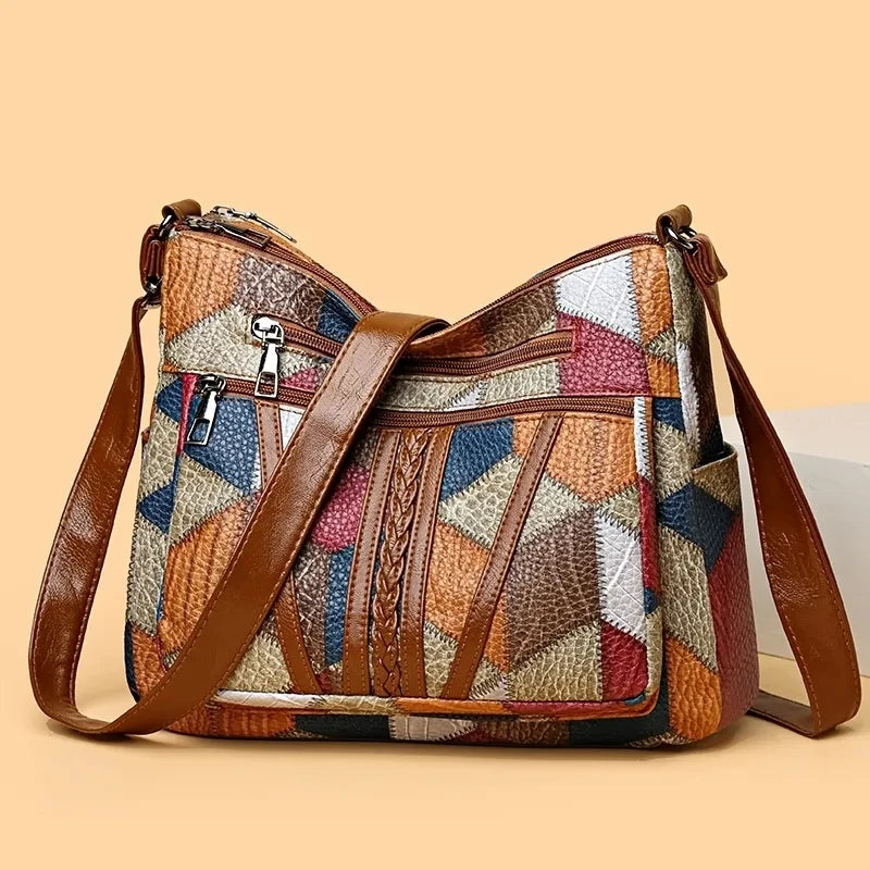Patchwork-Tasche für den Alltag mit Einsätzen aus Kunstleder.