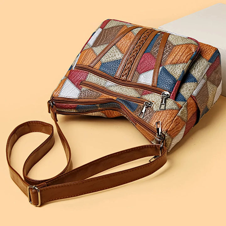 Patchwork-Tasche für den Alltag mit Einsätzen aus Kunstleder.