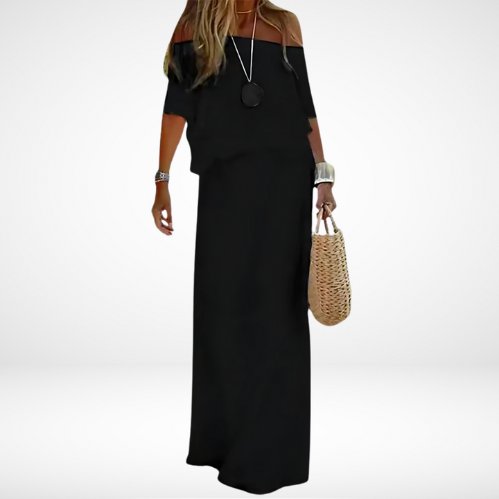 Elegantes weißes schulterfreies Maxikleid für den Strand
