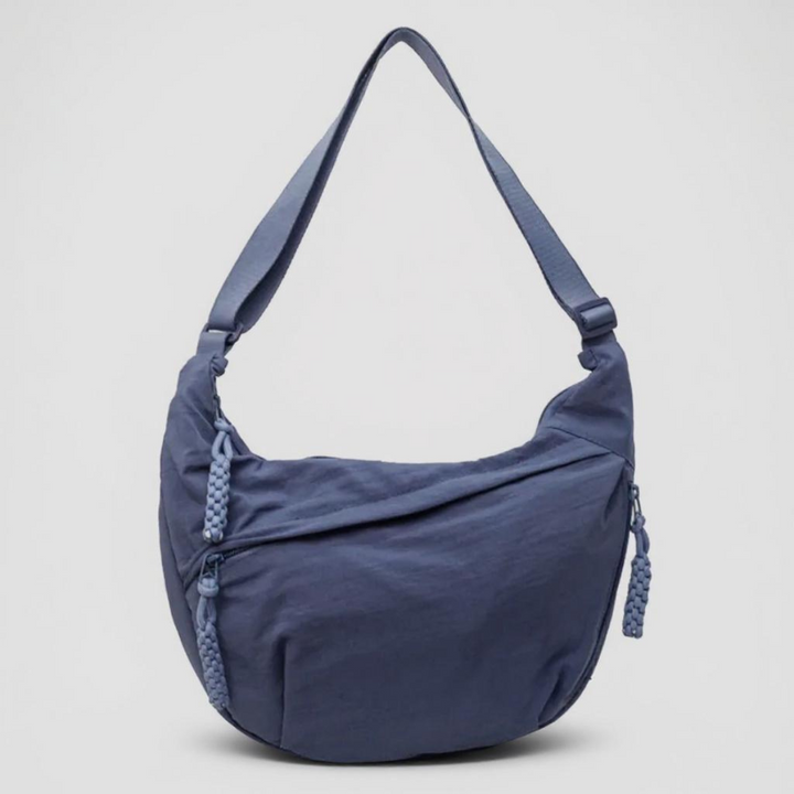 Blaue Halbmond-Schultertasche mit verstellbarem Schulterriemen