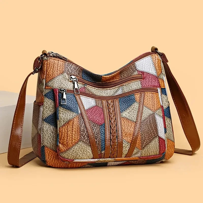 Patchwork-Tasche für den Alltag mit Einsätzen aus Kunstleder.