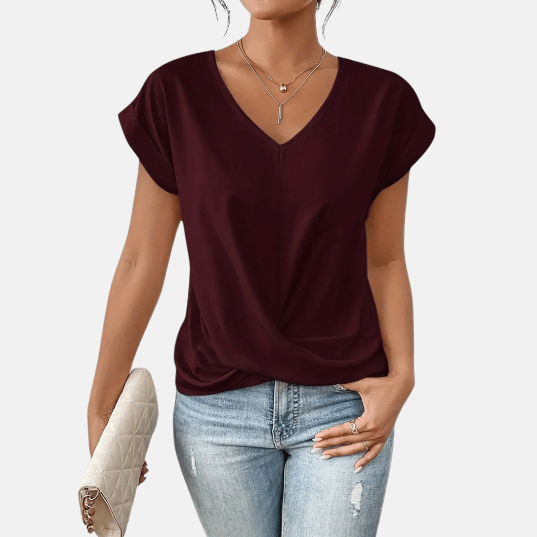 Damenbluse mit V-Ausschnitt und drapiertem Saum