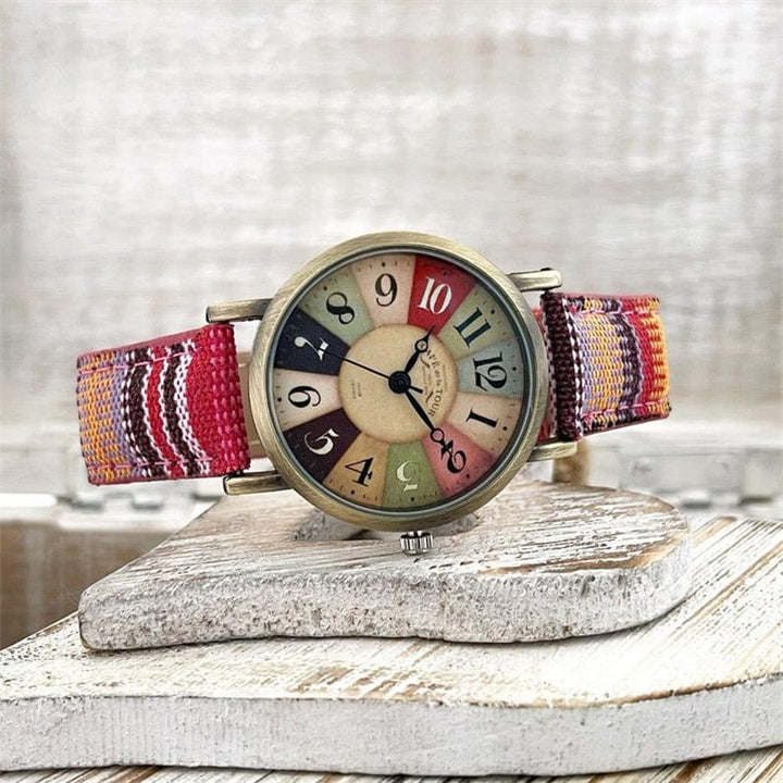 Uhr mit mehrfarbigem Regenbogenmuster und geflochtenem Armband – Elyvra