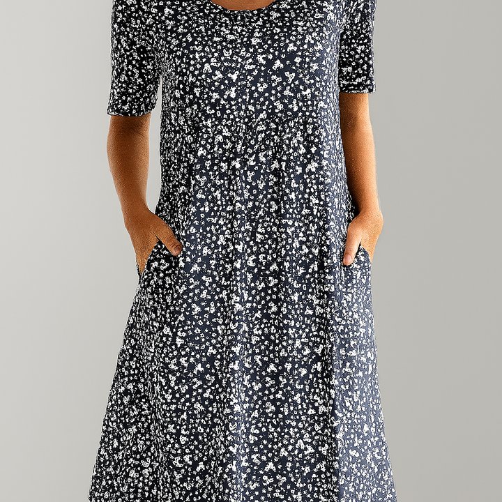Blumiges Midikleid mit hoher Taille und Taschen