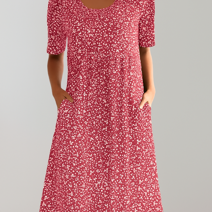 Blumiges Midikleid mit hoher Taille und Taschen
