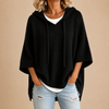 Gestrickter Poncho mit Kapuze und Dreiviertelärmeln
