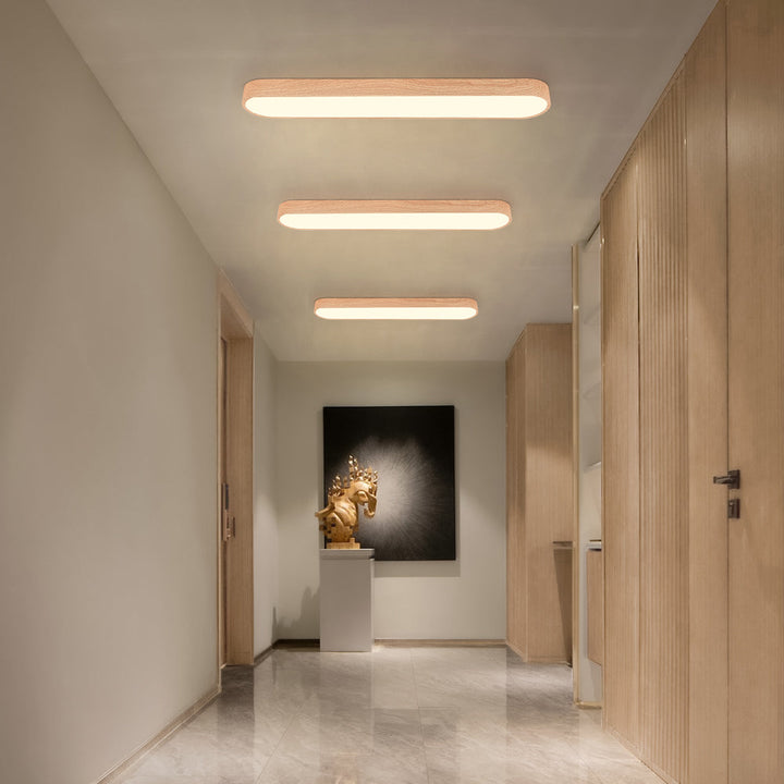 Ovale LED-Deckenleuchte Nordic Glow mit Holzakzent