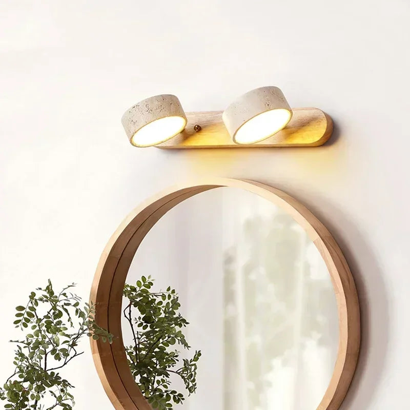 Moderne LED-Wandleuchte mit drehbaren Steinschirmen und Holzsockel
