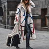 Warme Damenjacke mit Taschen