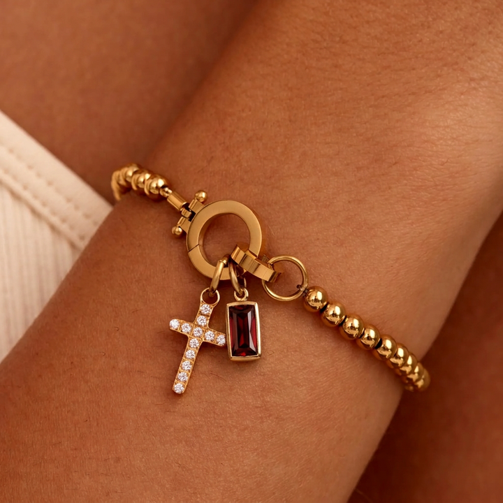 Nova-Perlen-Geburtssteinarmband mit Kreuzanhänger